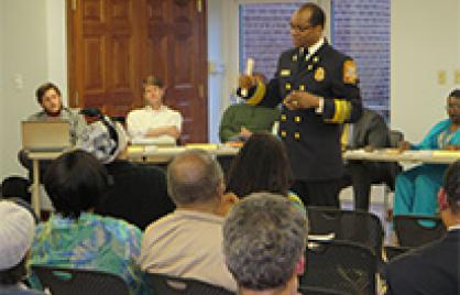 F&EMS Chief Kenneth B. Ellerbe outlines the Department’s EMS resource redeployment plan to attendees of Wednesday’s ANC 4C meeting at the Petworth Library